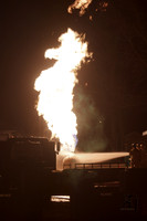 Two teams move in to put out a propane tank fire